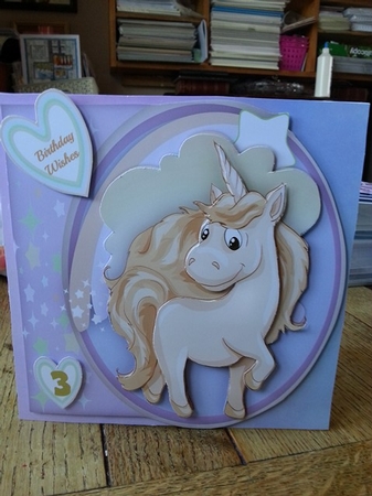 Cute Buff  Unicorn  by Ann Davies