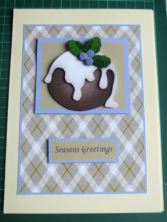 Christmas Pud on Blue Tartan by Catherine Nelson