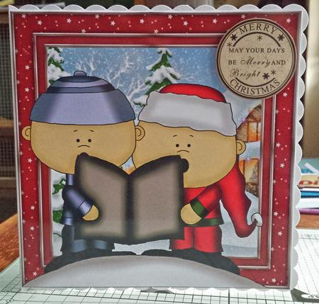 Caroling Christmas Couple by Catherine Nelson