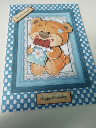 Teddy Bear Enjoying Chocolate by Janet Barker