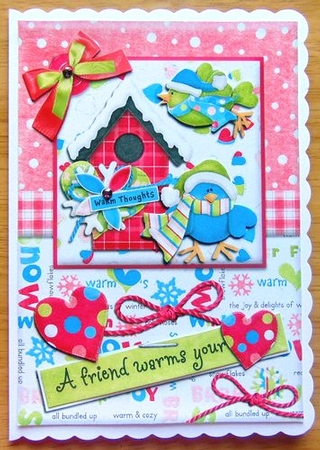 A Friend Warms Your "heart" Christmas Card Front Pink by Joyce Watson