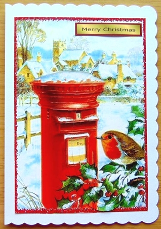 Cute Robin in Snow Village Oval Pyramids by Joyce Watson