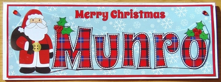 Santa in coat MUNRO large dl by Joyce Watson