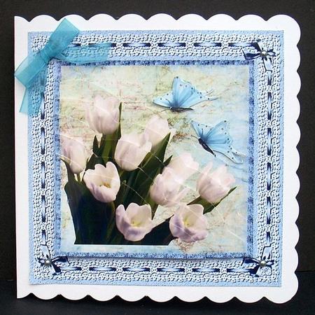 Tulips and Butterflies (white on Blue) by Joyce Watson