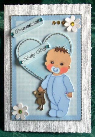 Cute Baby Boy in Blue Baby Grow with Blue Quilted Heart by Joyce Watson