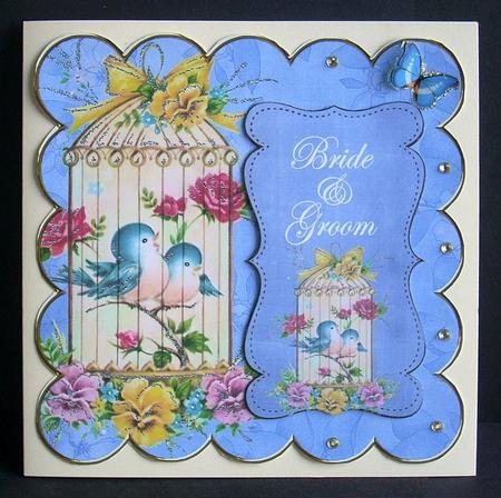 Blue Lovebirds Bride & Groom 8in Scallop Topper by Joyce Watson