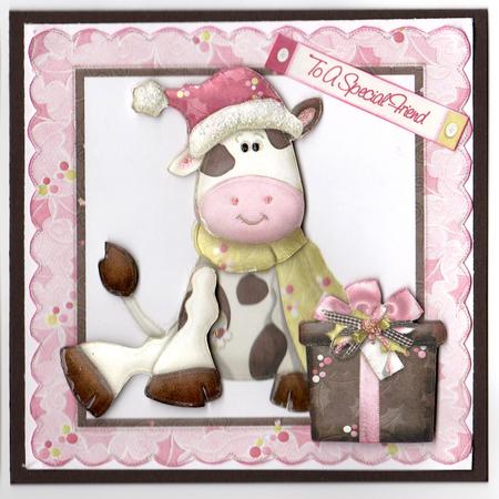 Little Cow Sitting in Santa Hat with Present by Susan Schmidt
