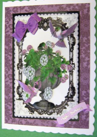 Geraniums in a Pot with Humming Birds by Ali Sherman
