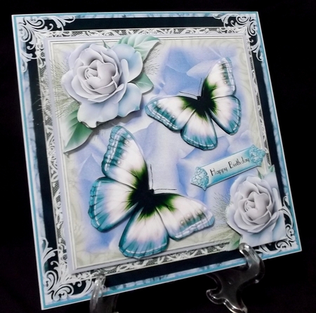 Soft Blue Rose Flutters by Allen Bowen