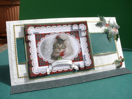Tabby Kitten Says Merry Christmas in English Spanish German by Andrea Chapman