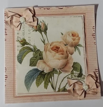 Pretty vintage pink rose with bows in cardboard effect 8x8 frame by Anette De Villiers