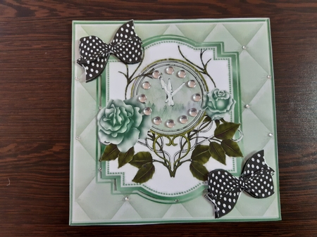 Lovely green roses with ornate clock in quilt  with blk polka dot bows 7x7 by Anette De Villiers