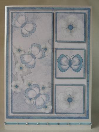 Blue Flutterby Blossoms A5 Card Front by Angela Butters
