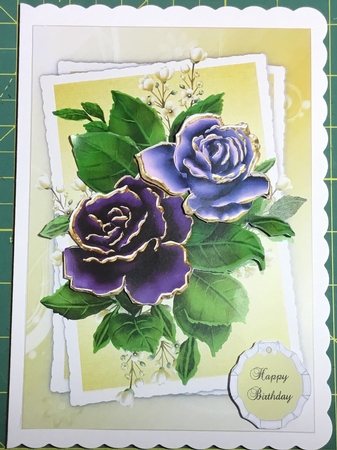 Lovely purple and lilac rose topper by Angela Riley
