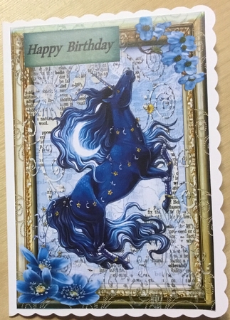 Blue and Pink Unicorn toppers  by Angela Riley