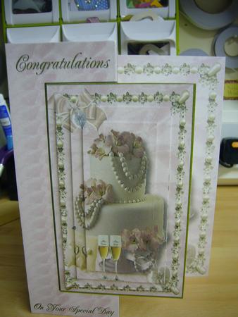 White & Pink Wedding Cake, Cushion with Rings, A4 by Angela Sangster
