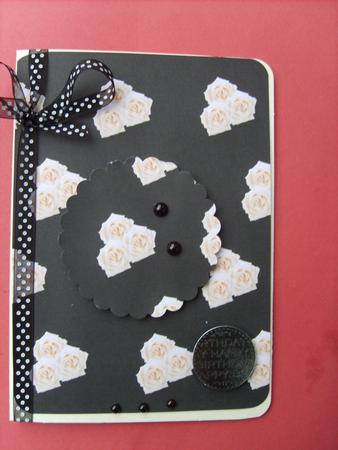 Black Background with Trio of Cream Roses by ANGELA STYLES