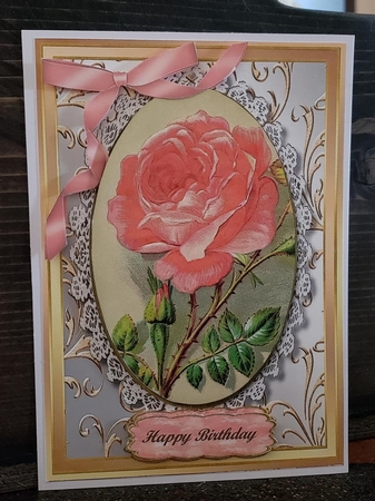 Stunning Pink Roses in a Oval Plaque  by Angela Taylor