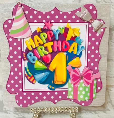 1st Birthday in funky purple polkadot frame with present  by Anita Henery