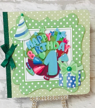 1st Birthday in funky green polkadot frame with present by Anita Henery