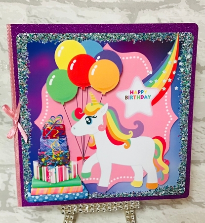 Rainbow unicorn Birthday card front by Anita Henery
