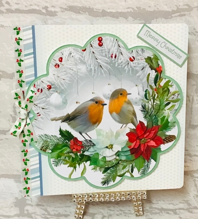 Robins and poinsettia scallop with pyramid layers by Anita Henery