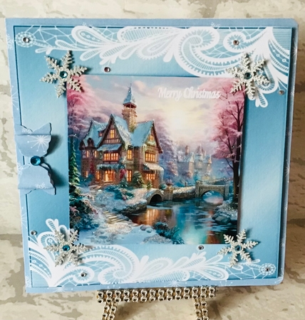 Snowy cottages by Anita Henery