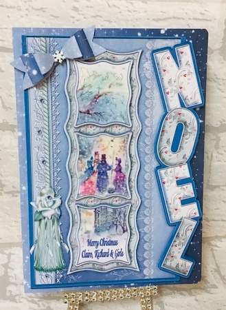 Christmas Carollers Over the Side Noel by Anita Henery