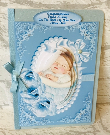 Pretty Baby Boy, with Bow in Pearl Frame Oval Pyramids by Anita Henery