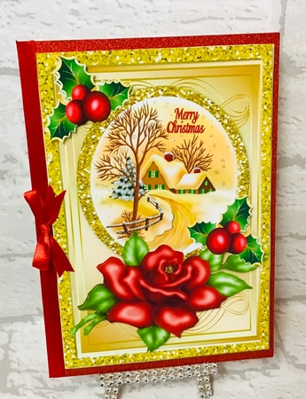 pretty snow cottage with red rose and holly A5 by Anita Henery
