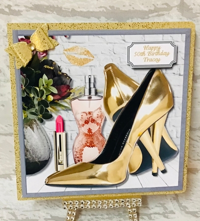 Gold shoes, flowers, lipstick and perfume by Anita Henery