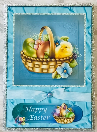 Easter Basket with chick, eggs, flowers in blue by Anita Henery