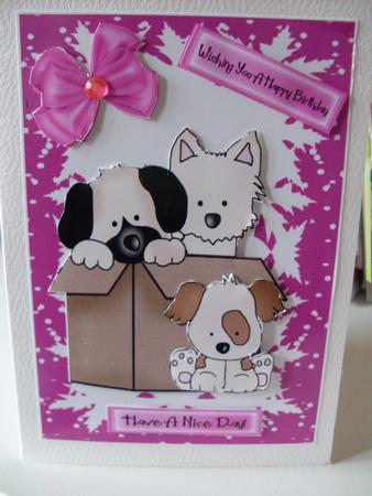 Cute Little Puppies in a Box by Ann Ramsell