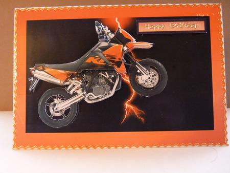 Orange Bike on Lightning Background by Ann Ramsell
