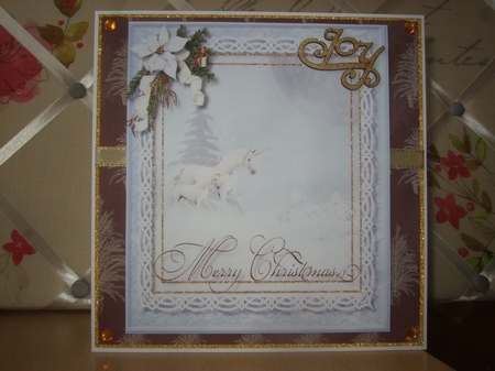 Beautiful Unicorns in the Winter Snow  by Ann-Marie Lawson
