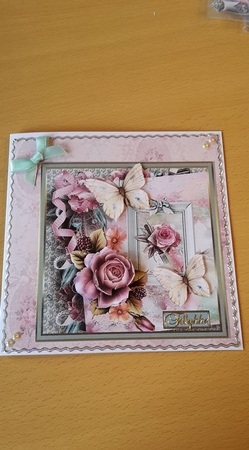 Wild rose and butterfly by Ann-Marie Mathiesen