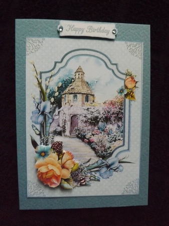 Dovecote Cottage with Roses and Iris by Ann McKenzie