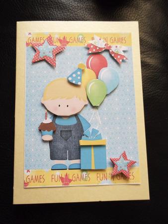 Little Boy with Birthday Cake by Ann McKenzie