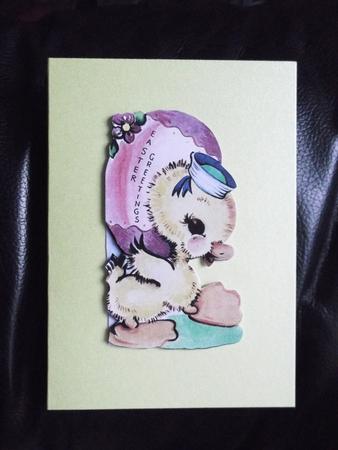 Chick Holding the Easter Egg by Ann McKenzie