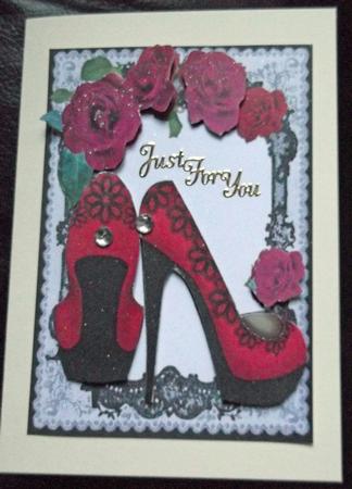 Red Shoes with Red Roses in Black Lace by Ann McKenzie