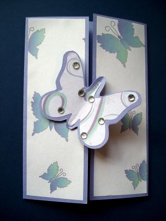 Blue-green Butterflies on Powder-blue by Anna Ruth Wilson