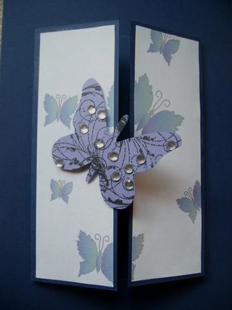 Blue-green Butterflies on White by Anna Ruth Wilson