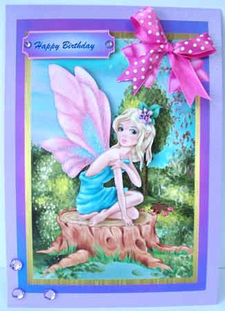 Beautiful Fairy Sitting on a Tree Stump by Annatjie van Wyk