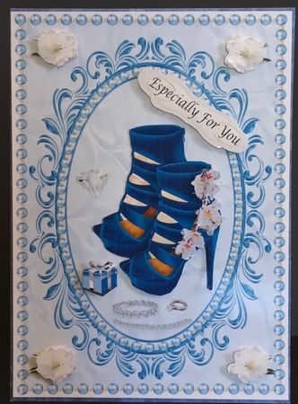 Stiletto suede Blue ankle boots in oval frame with accessories by Anne Sutherland