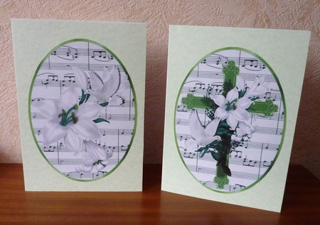 two lovely sympathy toppers of a green cross, white lillies, & doves by Anne Jackson
