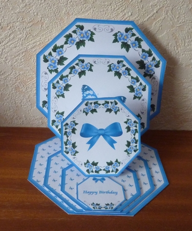 Blue floral octagonal triple easel card with matching envelope. by Anne Jackson
