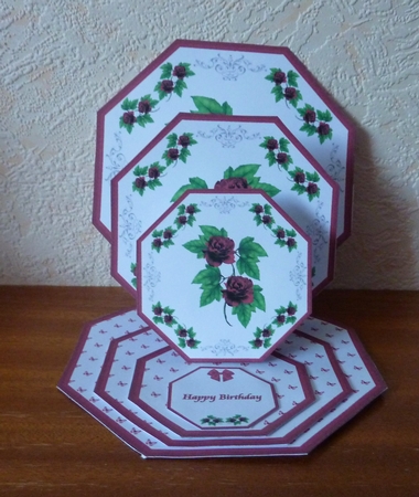 Red floral octagonal triple easel card with matching envelope. by Anne Jackson