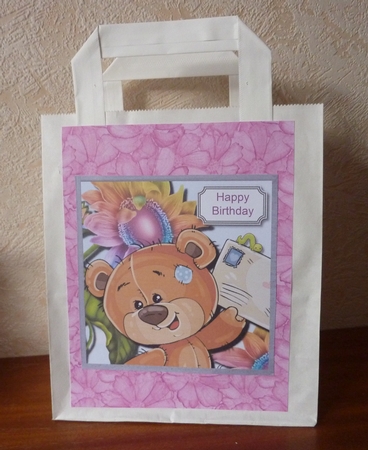 Teddy with flowers by Anne Jackson