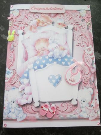 Beautiful Baby Asleep in the Cot  by Anne-marie Wheeler