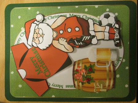 Santa Loves Football and a Pint by Anne-marie Wheeler